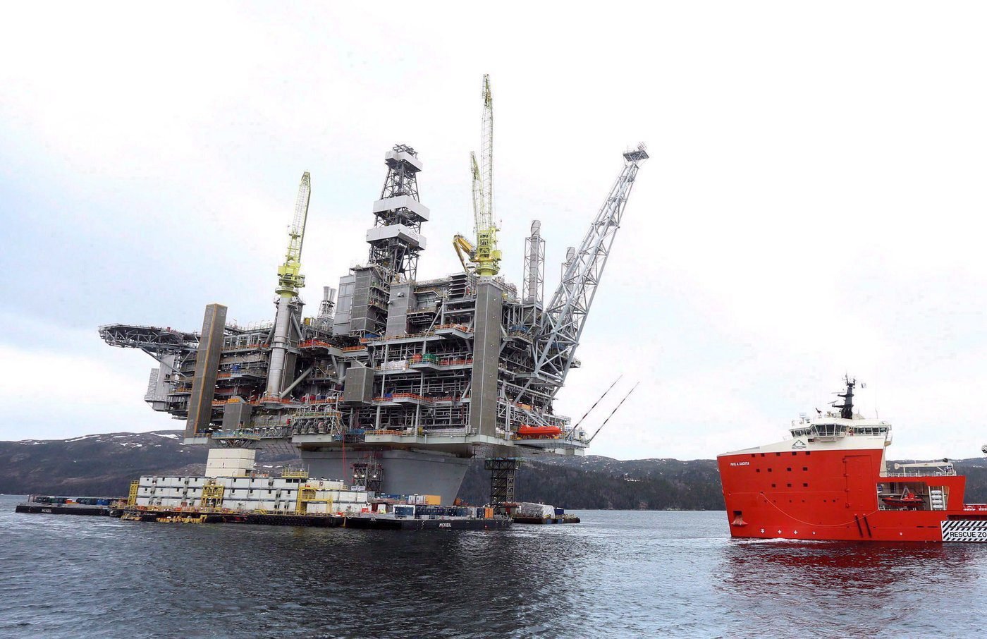 Credit agency says surging global oil prices will help N.L.’s bottom line