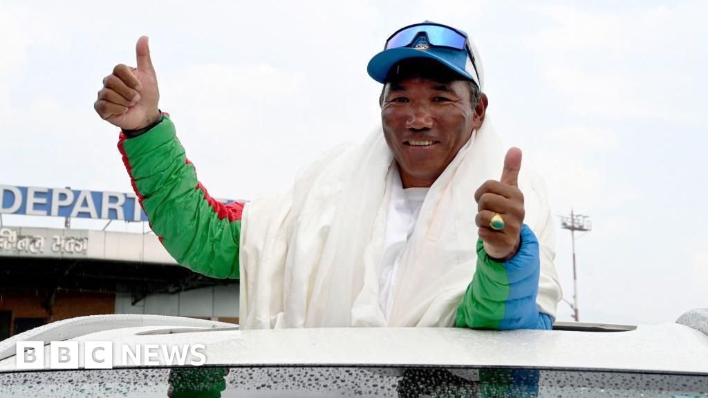 'Everest Man' and 'Mountain Queen' break own records scaling world's tallest peak