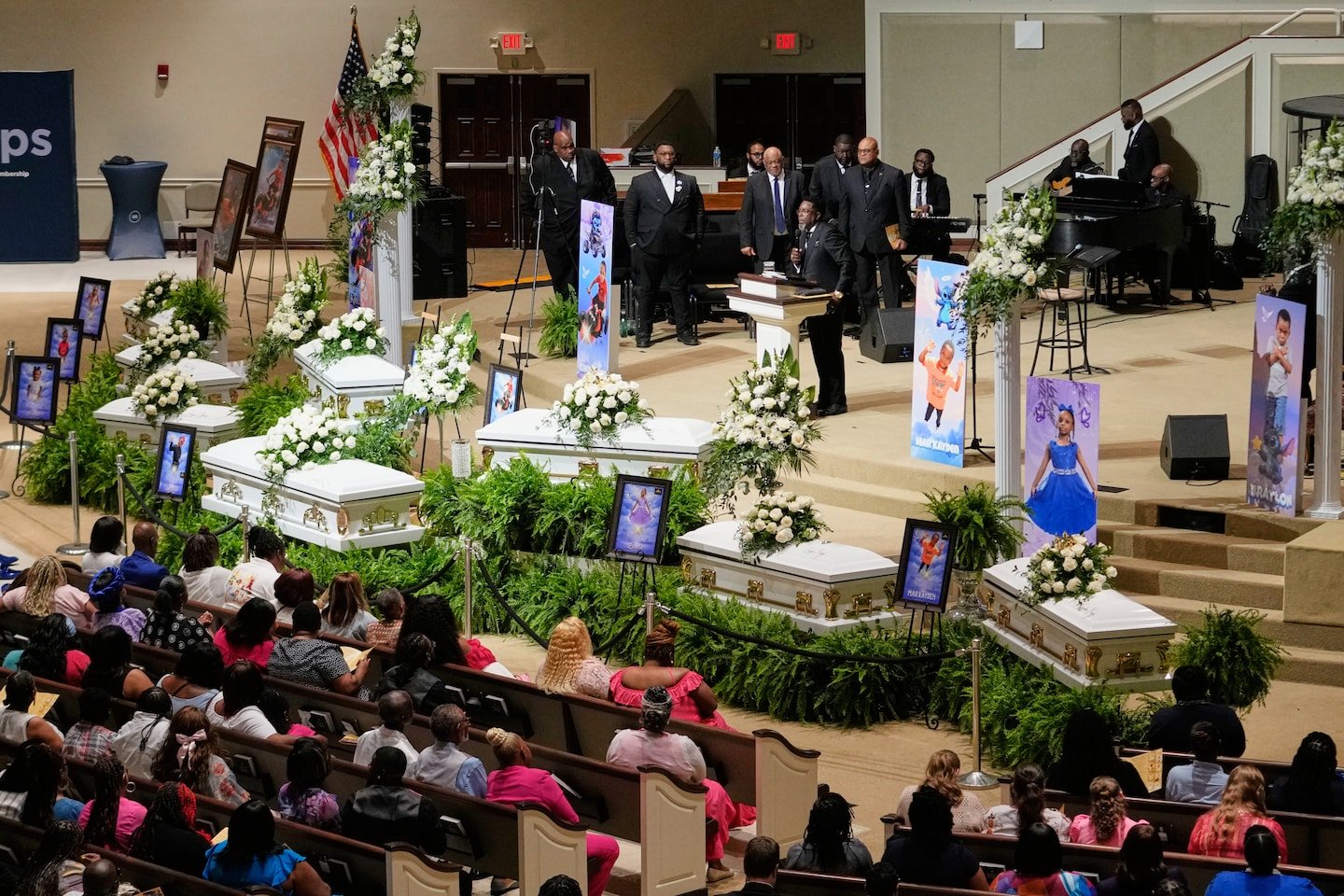 Eight murdered children mourned at mass funeral that captured national attention