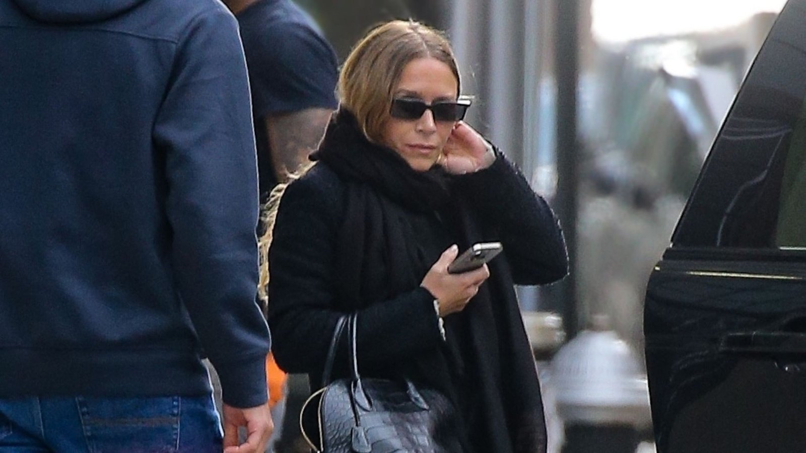 Mary-Kate Pairs Her £25K Bag With This Controversial Shoe Trend