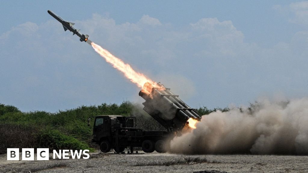 Japan’s defence minister denies militarism and criticises China’s ‘huge arsenal’