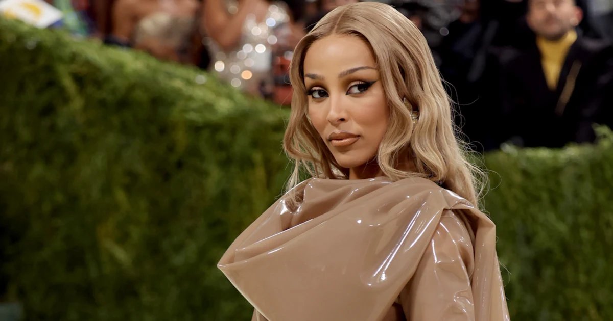 Doja Cat arrives in silicone Saint Laurent dress