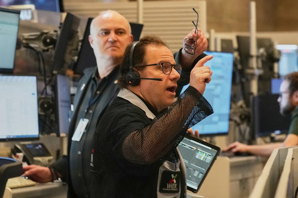 Wall Street drops from its records and oil prices jump after fighting flares in the Middle East