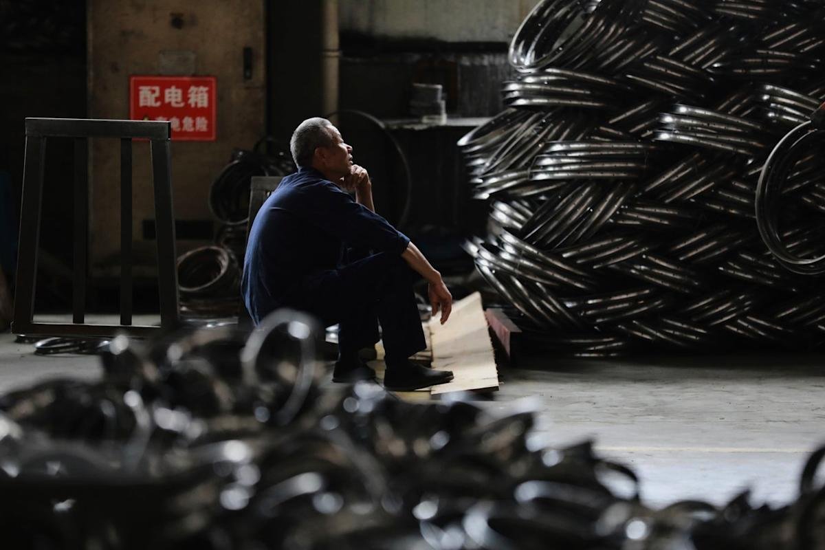 China’s factory activity slows in May, raising questions over its economy