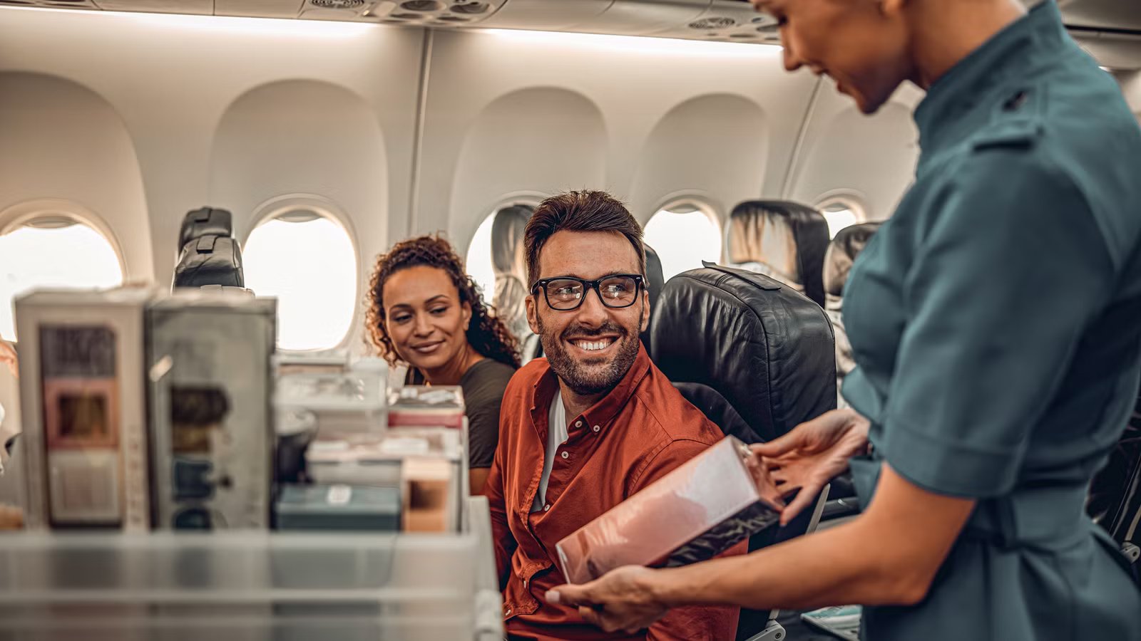 From Goody Bags To Overhead Bins: The Passenger Habits Flight Attendants Actually Love