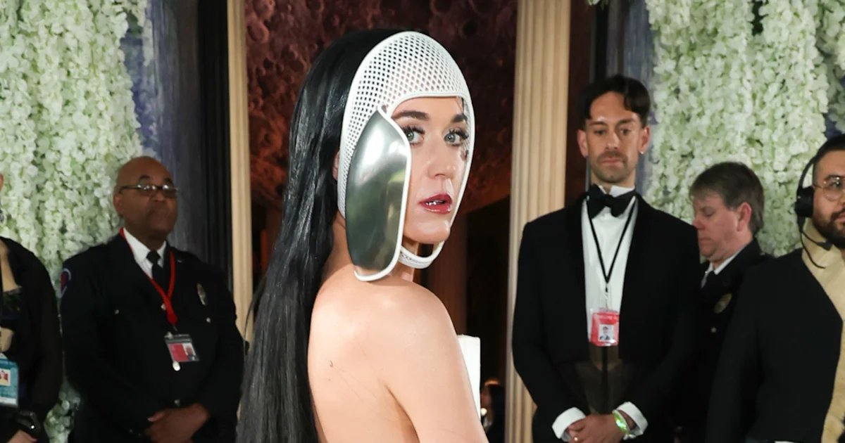 Katy Perry gives fans look behind mask