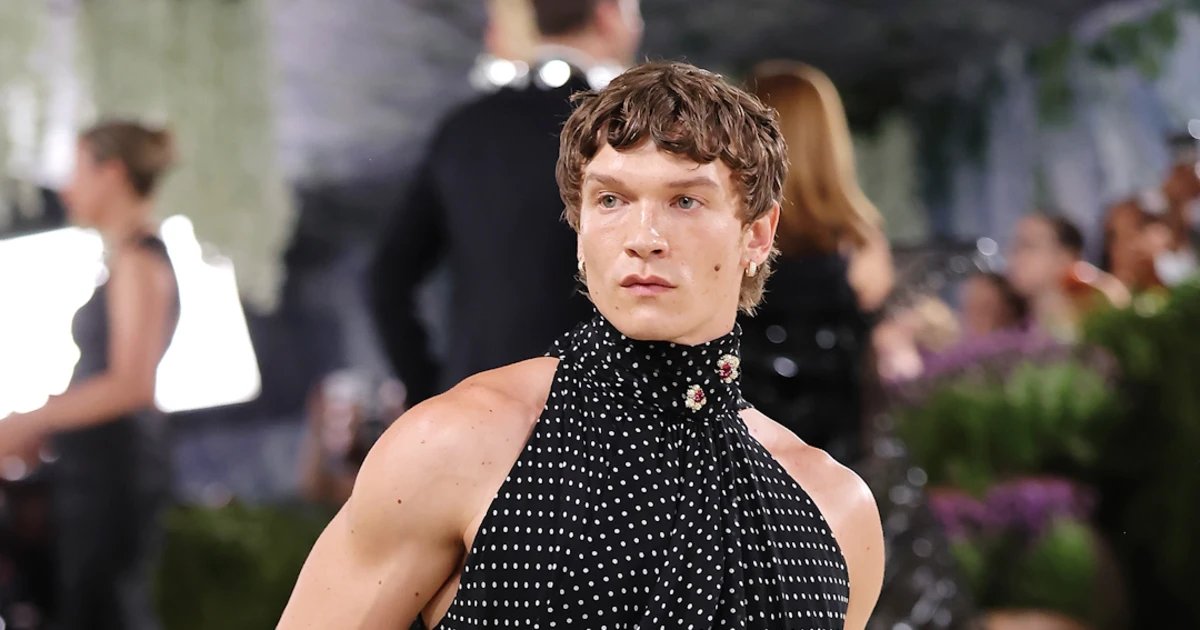Connor Storrie turns heads in sleeveless black ensemble