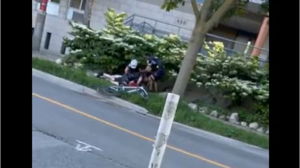 Video showing Toronto police tackling cyclist after alleged traffic violation sparks outcry