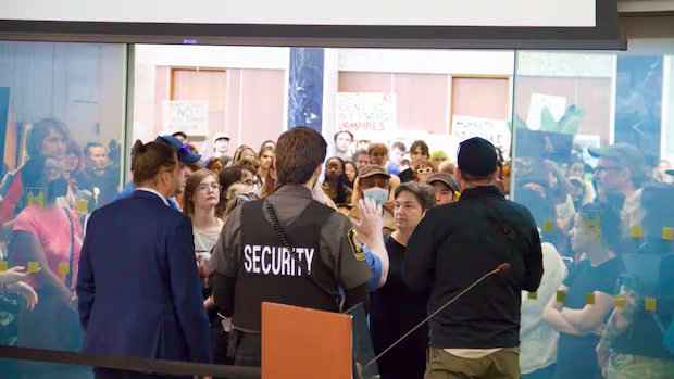Hundreds protest against data centre proposal at Hamilton city hall