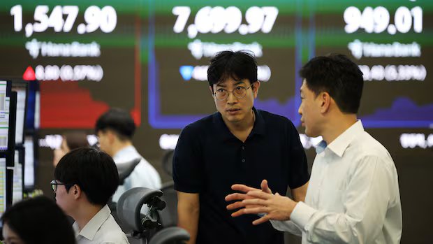 Global shares fall as tech stocks tumble