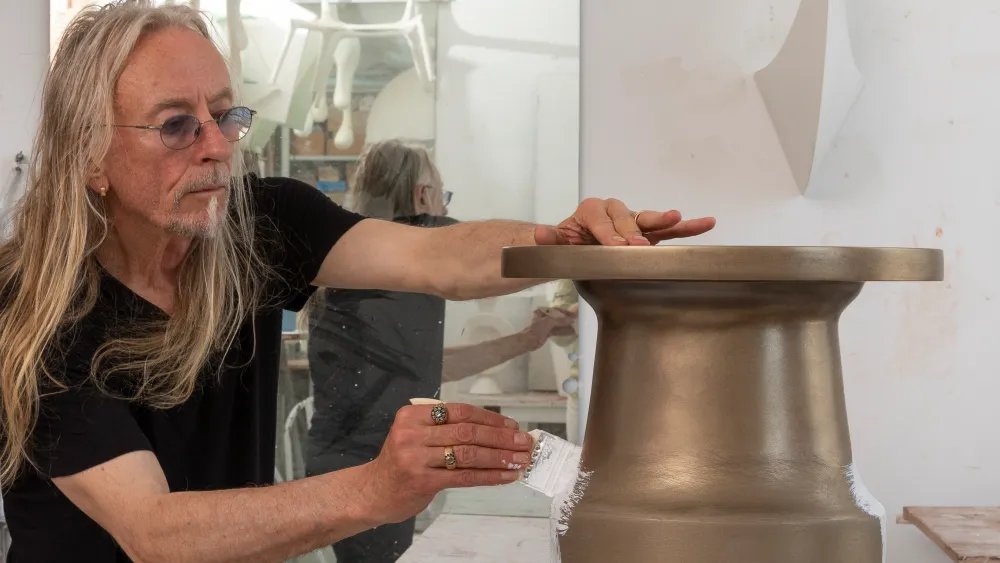 From Punk Rock to Minimalist Zen: Guggi’s Artistic Evolution and Bond with Bono