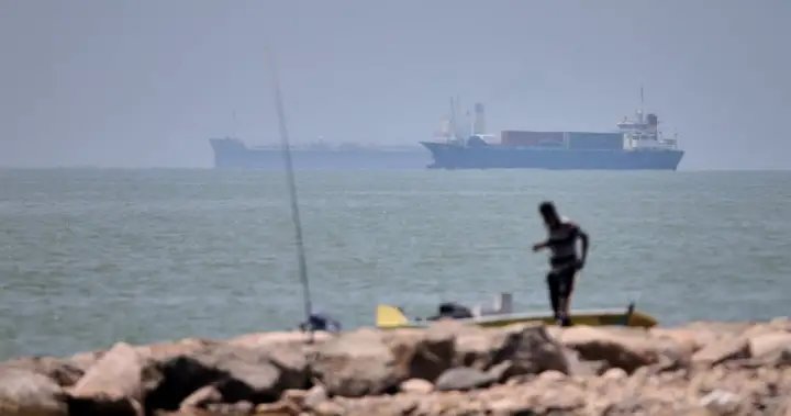Iranian drones attack Bahrain and a ship is struck in the strait after US airstrikes on Iran