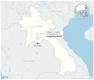 Rescuers search for alternative route to reach 2 missing in a flooded Laos cave