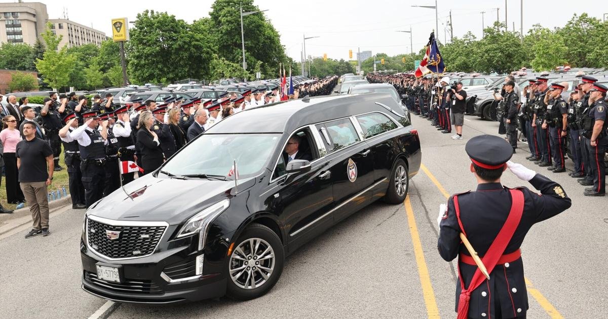 Procession will escort slain Toronto officer Marc Pinizzotto to funeral home Sunday