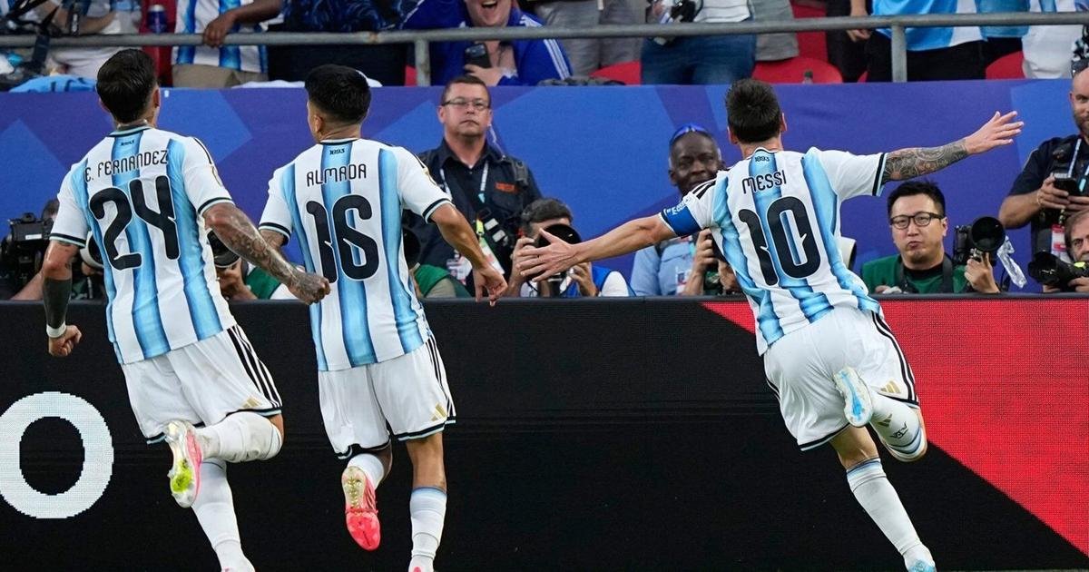 Lionel Messi ties men’s World Cup goals record with a hat trick as Argentina tops Algeria