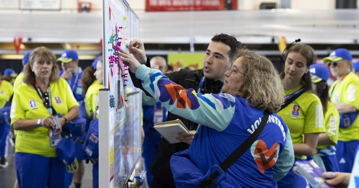 Why is FIFA relying on volunteers to help stage World Cup?