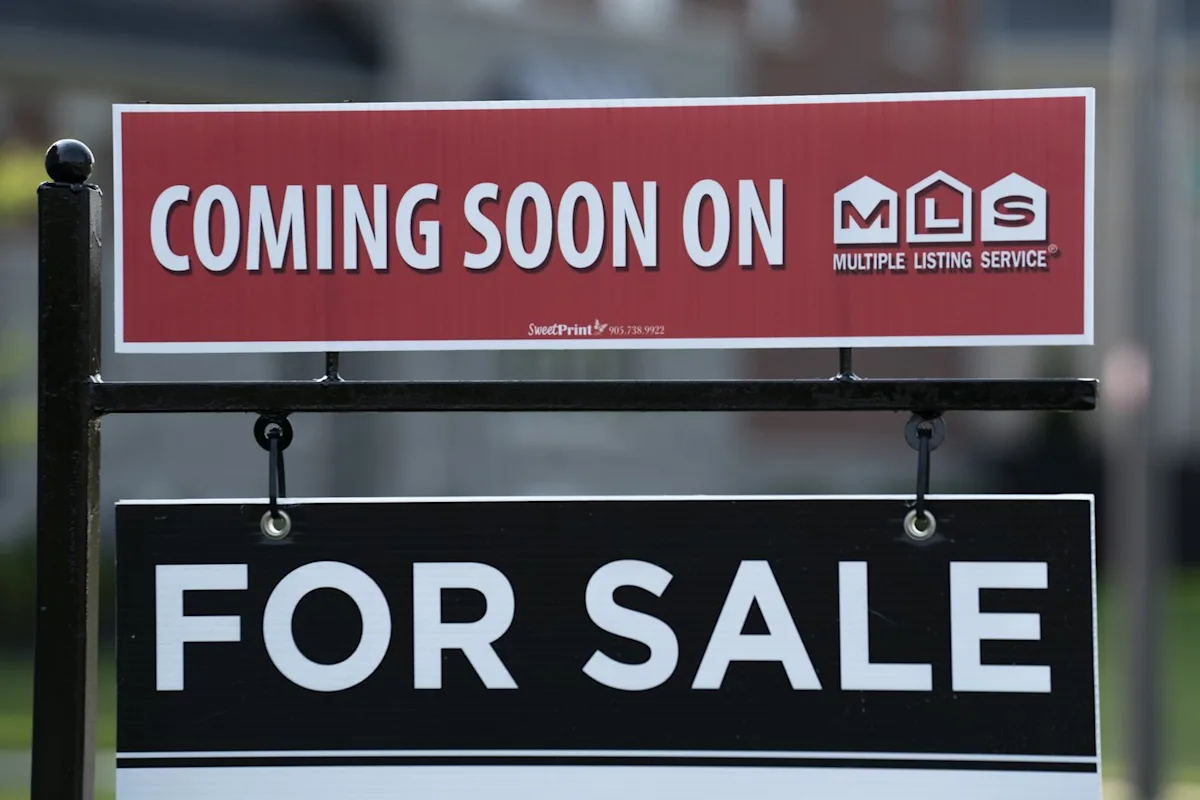 May home sales down 5.1 per cent from year earlier, but CREA says momentum building