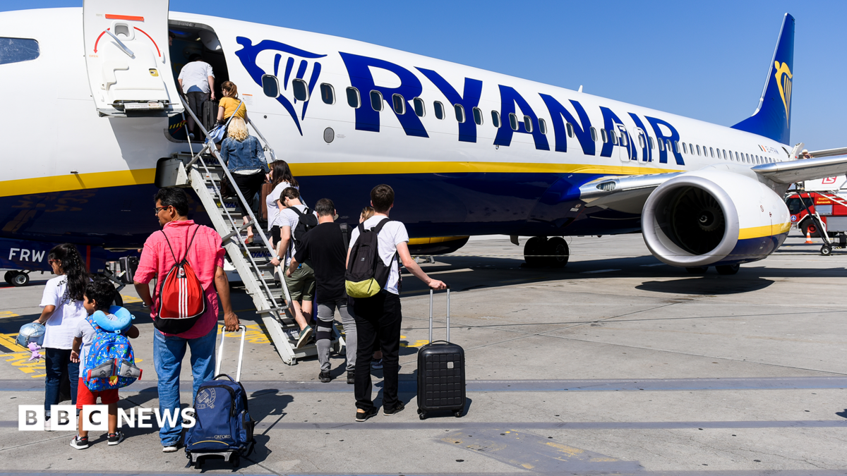 Ryanair says it will reluctantly let parents sit with children for free