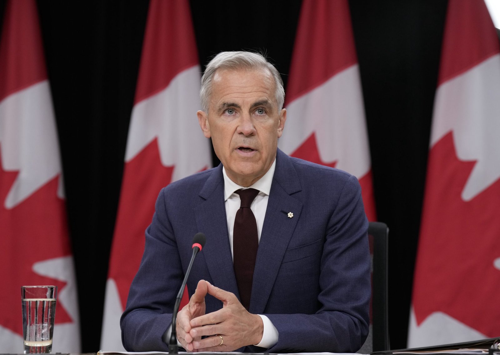 Carney defends B.C. condo deal as opposition parties slam feds…