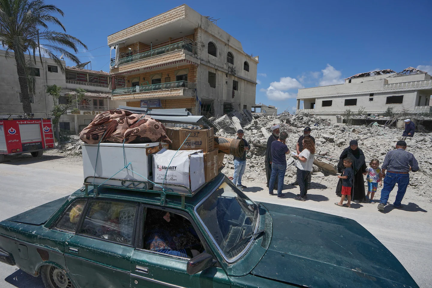 After news of Iran peace deal, Lebanese return home to assess wreckage