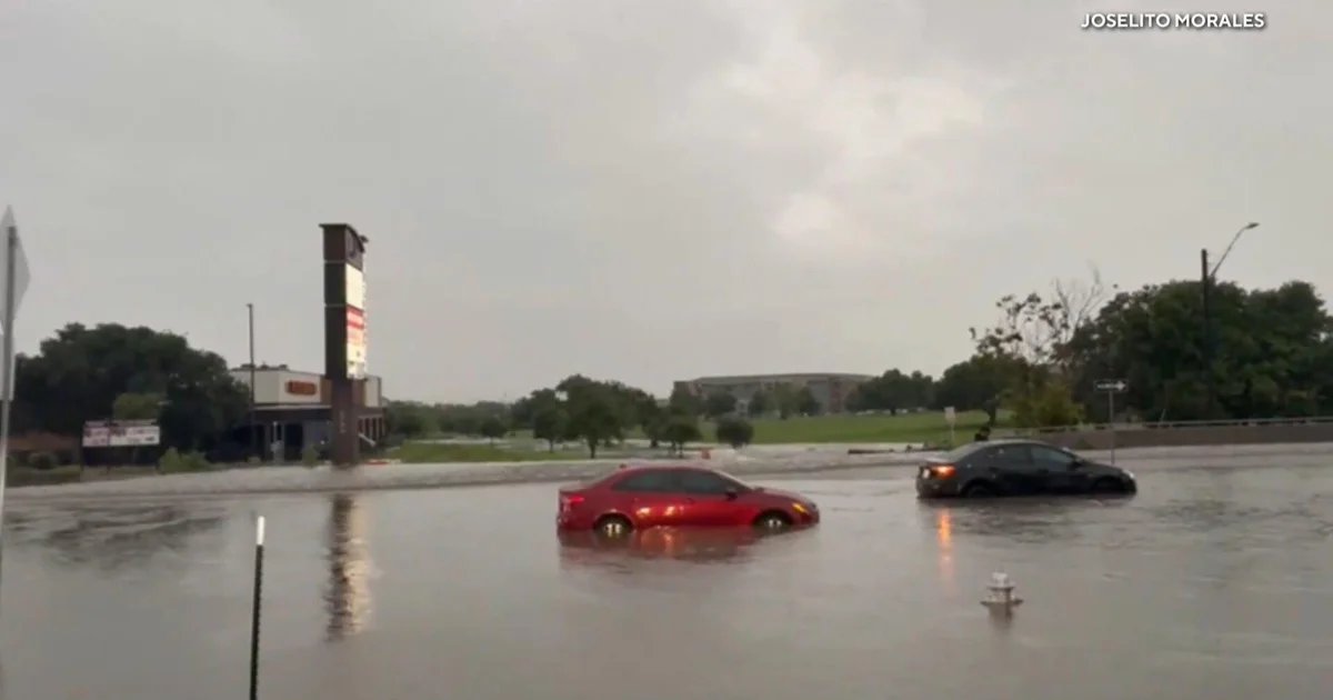 Heavy rain slams Texas, trapping drivers and damaging roads
