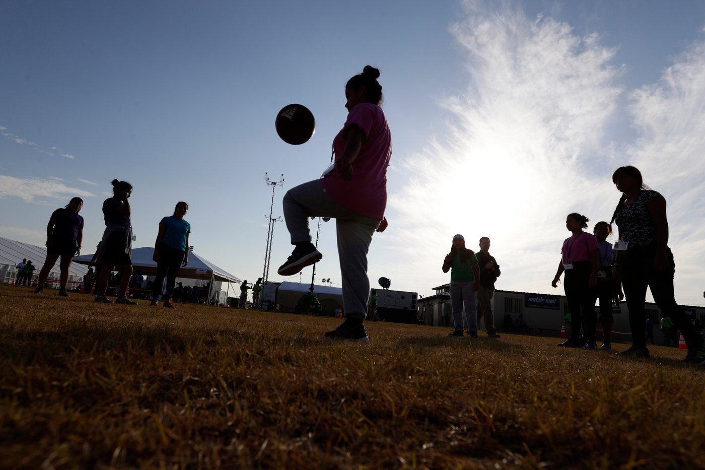 Legal groups that help migrant children say law enforcement visits were attempt at intimidation