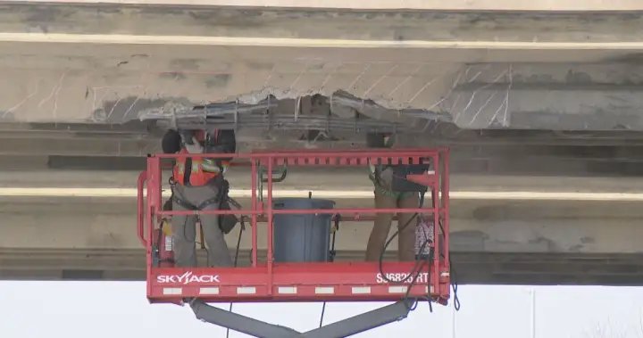 Semi-truck driver who struck Saskatoon overpass fined more than $11K