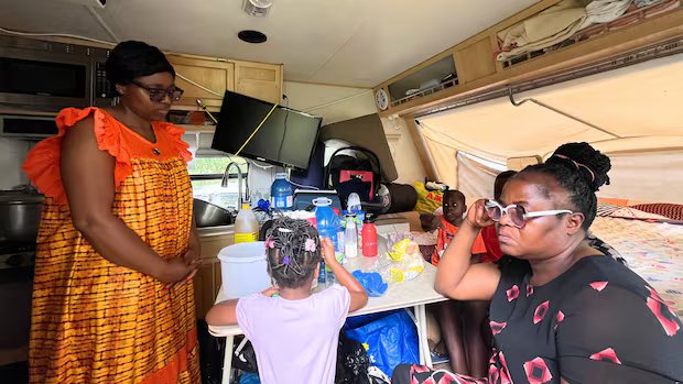 Montreal duplex dispute leaves family in a trailer, tenants facing uncertainty