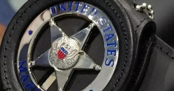 Louisiana man charged with murder in shooting of U.S. marshal, could face death penalty