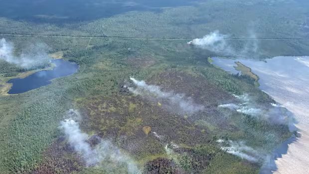Essential workers evacuate Wrigley, N.W.T., as fire nears