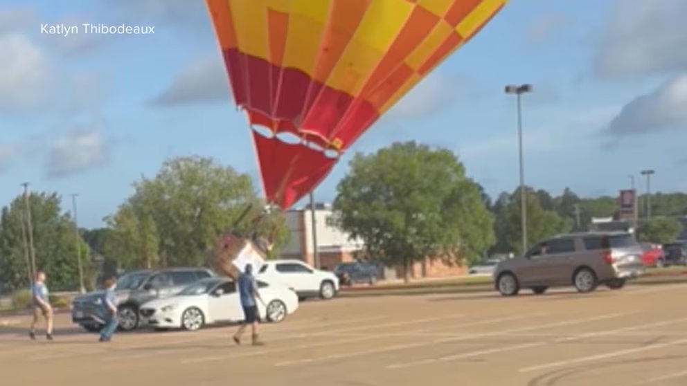 WATCH:  Low-flying hot air balloon slams into car in East Texas