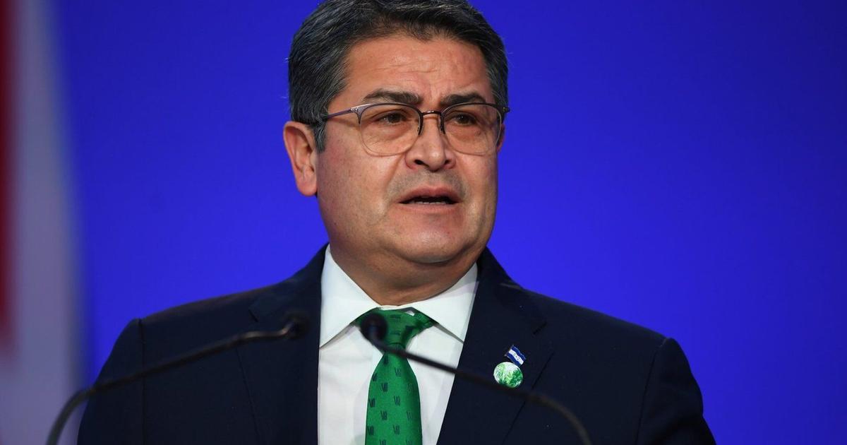 Former President Juan Orlando Hernández returns to Honduras after arrest warrant suspended