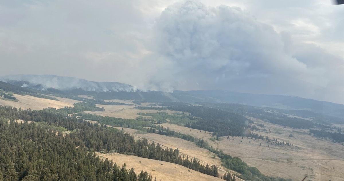 Wildfires merge, cross Highway 97 north of Clinton, B.C.