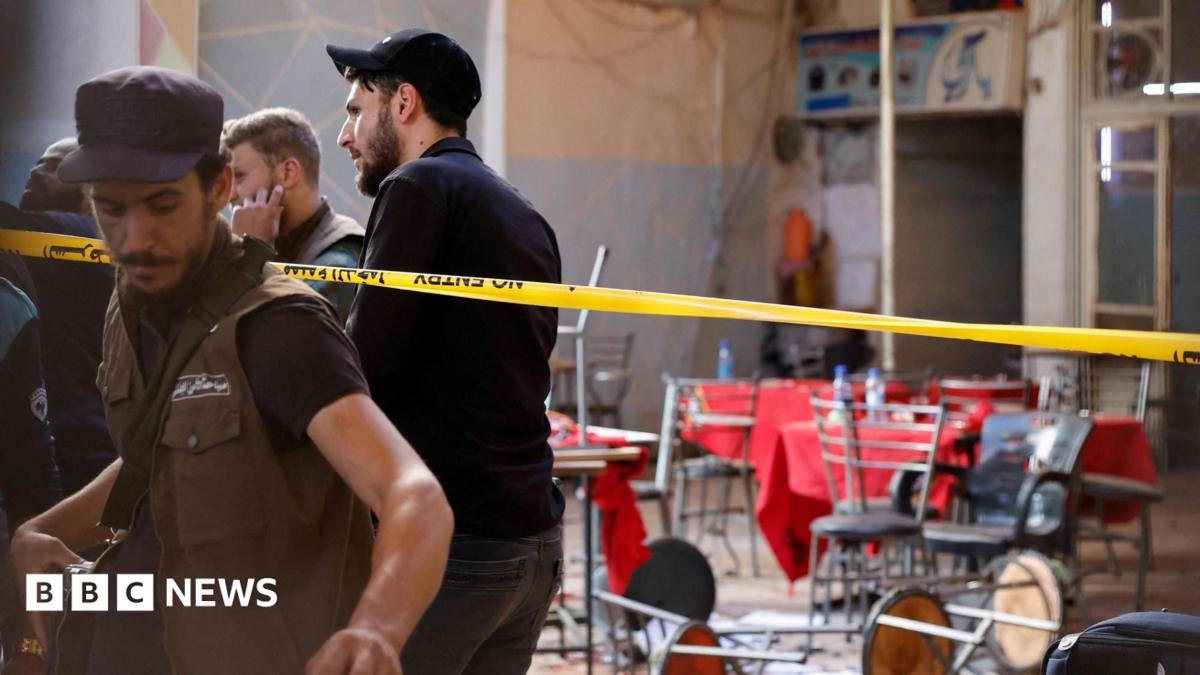 Bomb blast at central Damascus cafe kills six, state media say