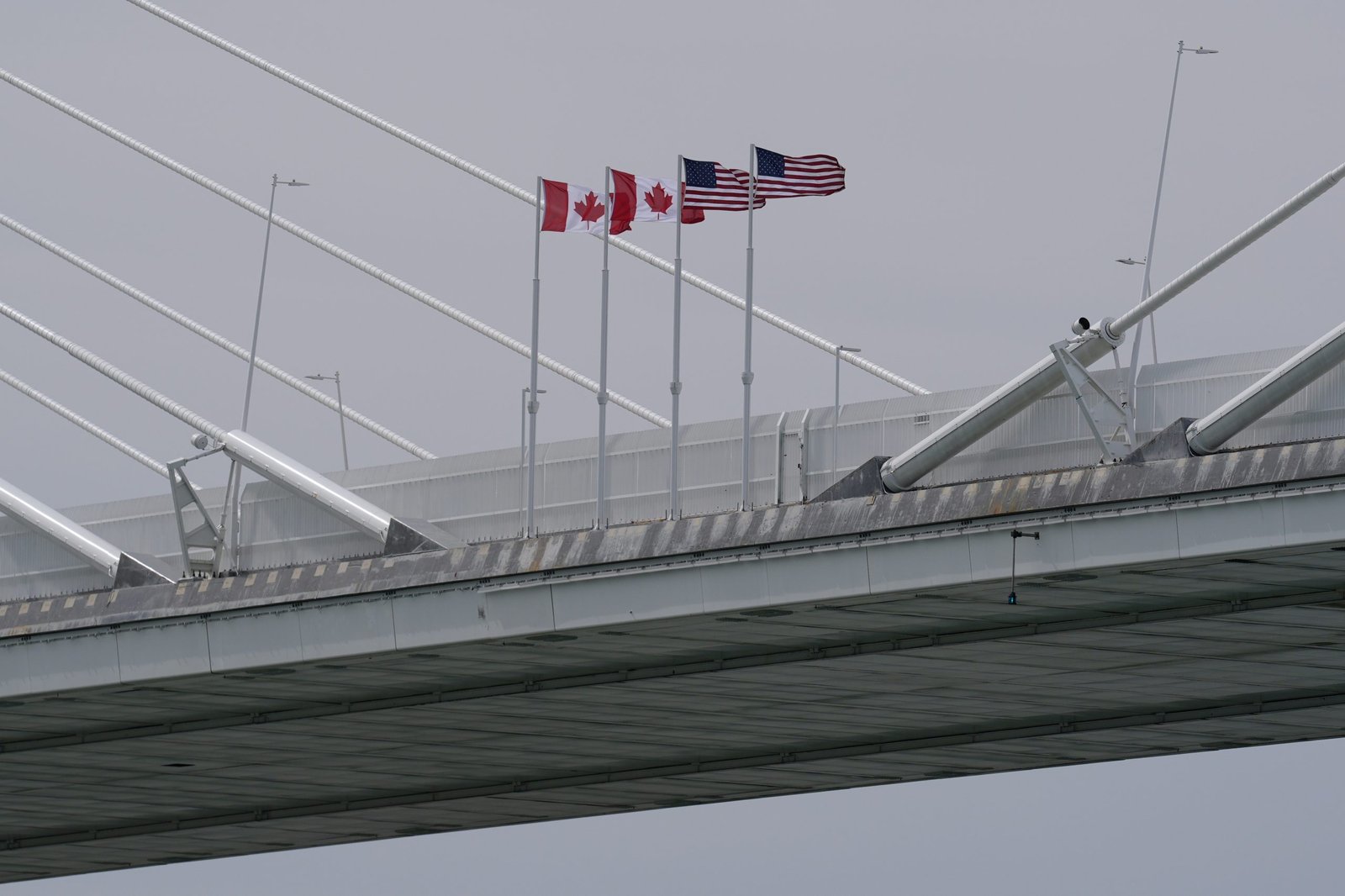 Carney defends deal to split net proceeds from bridge tolls as Conservatives call on his government to release the full agreement