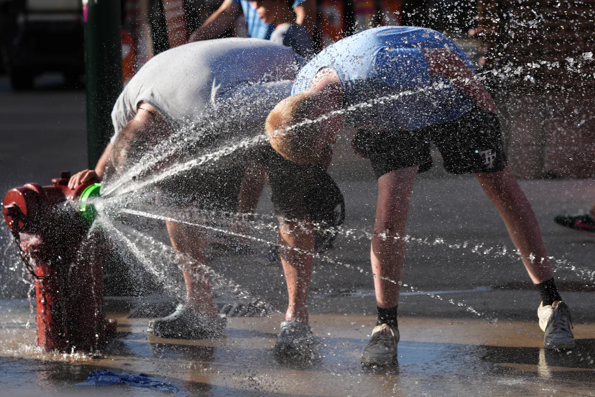 See how Americans are weathering a heat dome’s sweltering temperatures