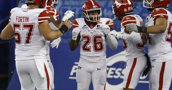 Stampeders stomp on Blue Bombers 52-30