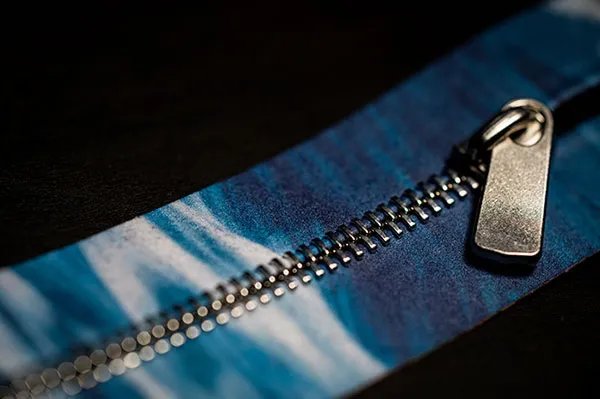 YKK and Epson Debuts Recycled Non-Woven Zipper Tapes