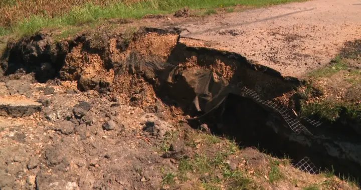 Cleanup underway but Alberta town faces long road to recovery after recent rains