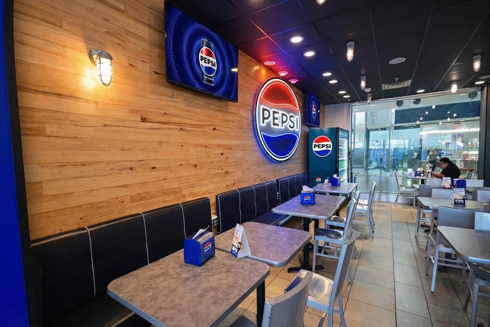 This new airport lounge will be free. One downside? No Diet Coke