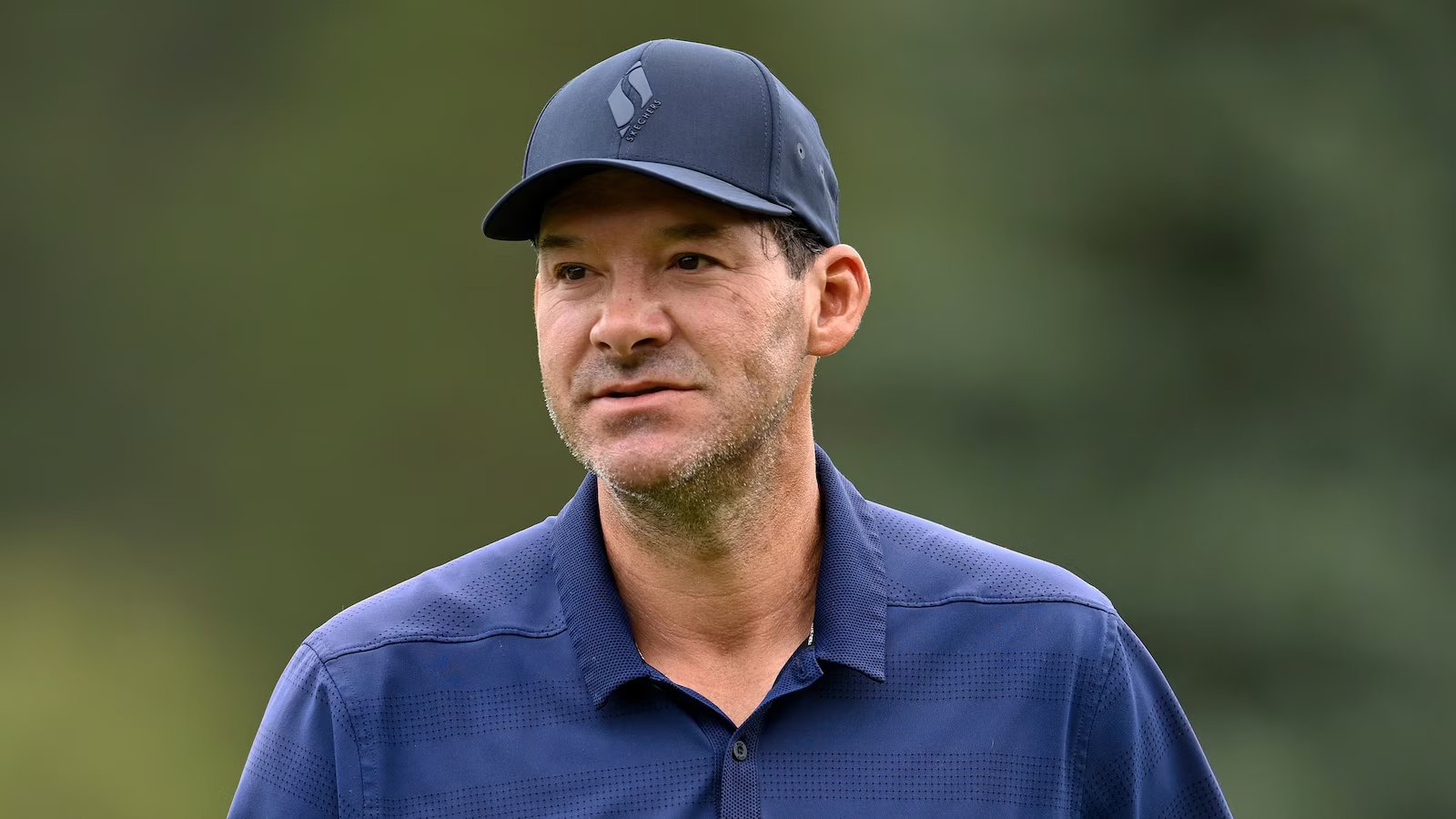 Tony Romo put on leave at CBS Sports following arrest