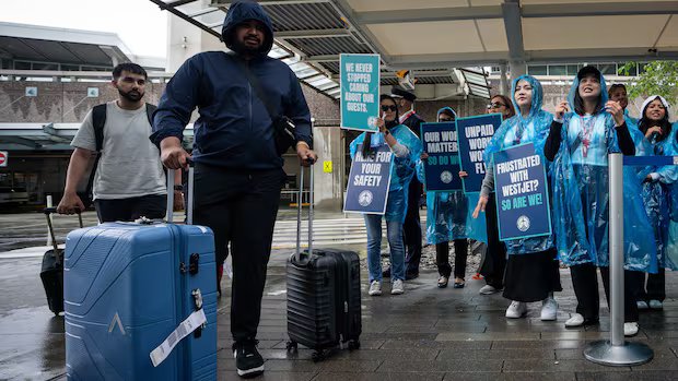 Travellers in limbo as WestJet flight attendants go on strike