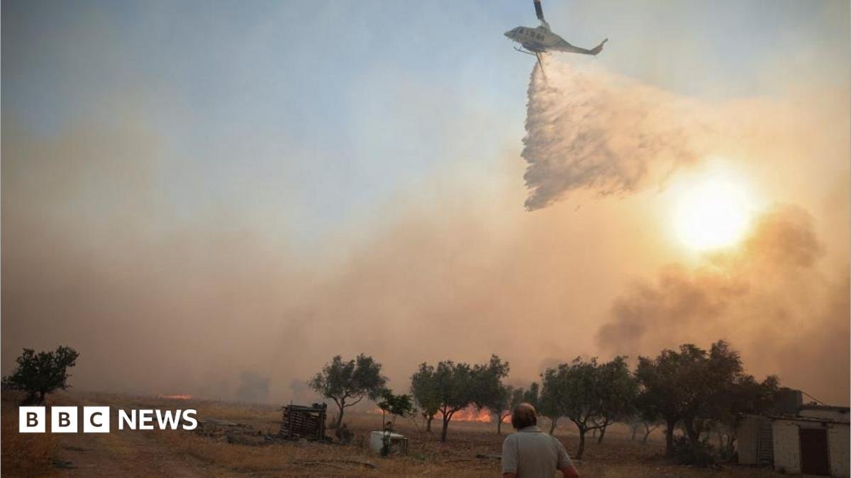 Two helicopters fighting Greece wildfires collide