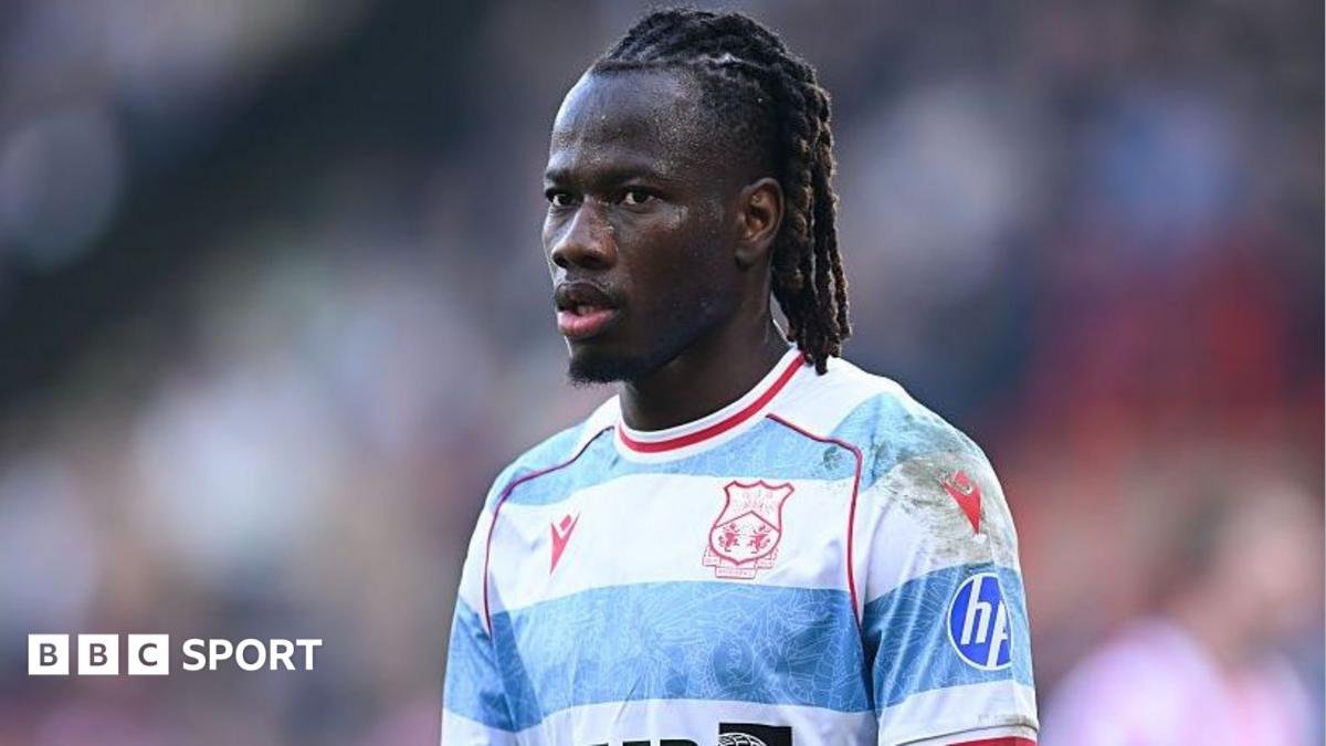 Issa Kabore: Man City defender poised for permanent Wrexham switch