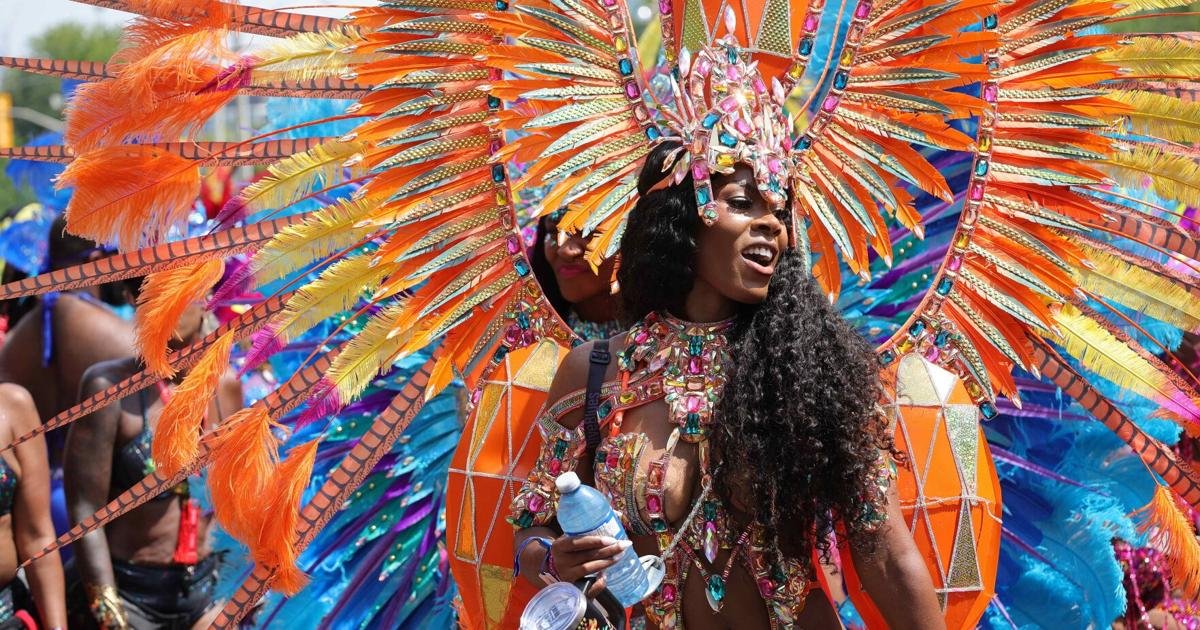Glittering costumes, beckoning beats draw fans from around the world to annual Caribbean Carnival Grand Parade