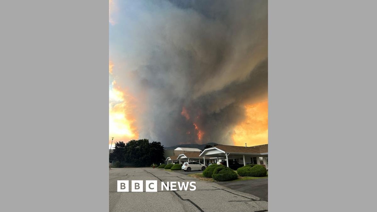 Fast-moving Canada wildfire doubles in size forcing thousands to flee homes