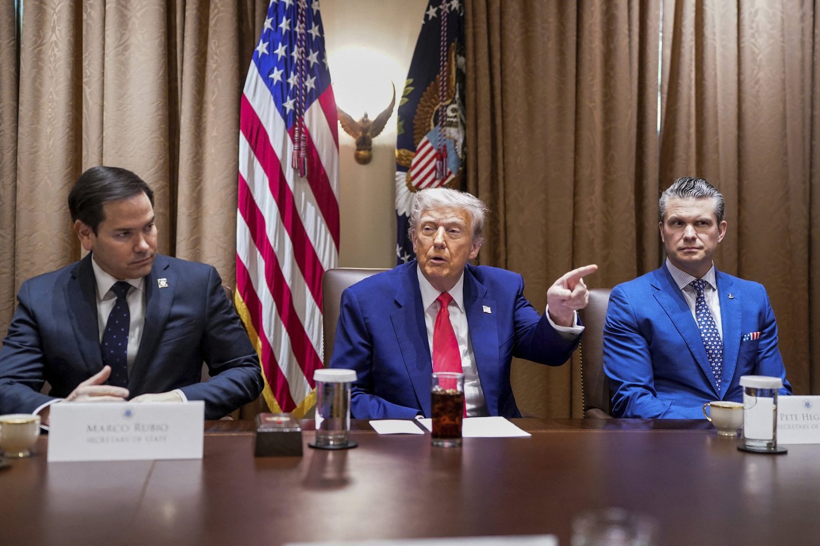 Trump threatens to hike tariffs on Canadian autos, steel to 50% in January