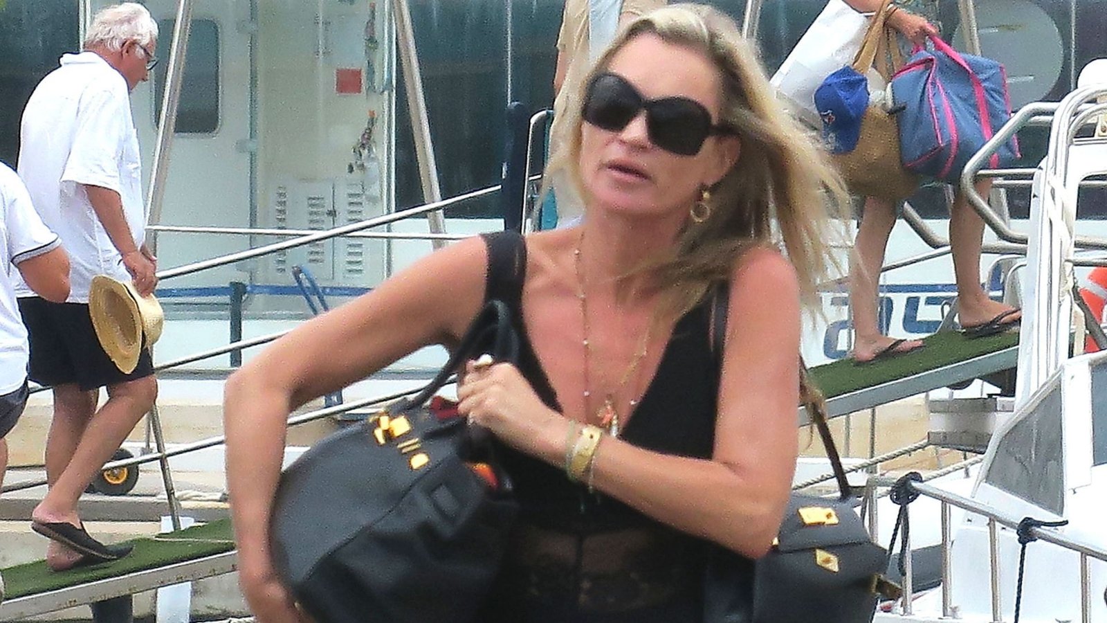 Kate Moss Just Arrived On Holiday Wearing Two Hermès Bags