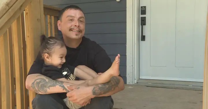 ‘It’s for the kids, and his kids’: Affordable homes from $1 lots in Winnipeg – Winnipeg