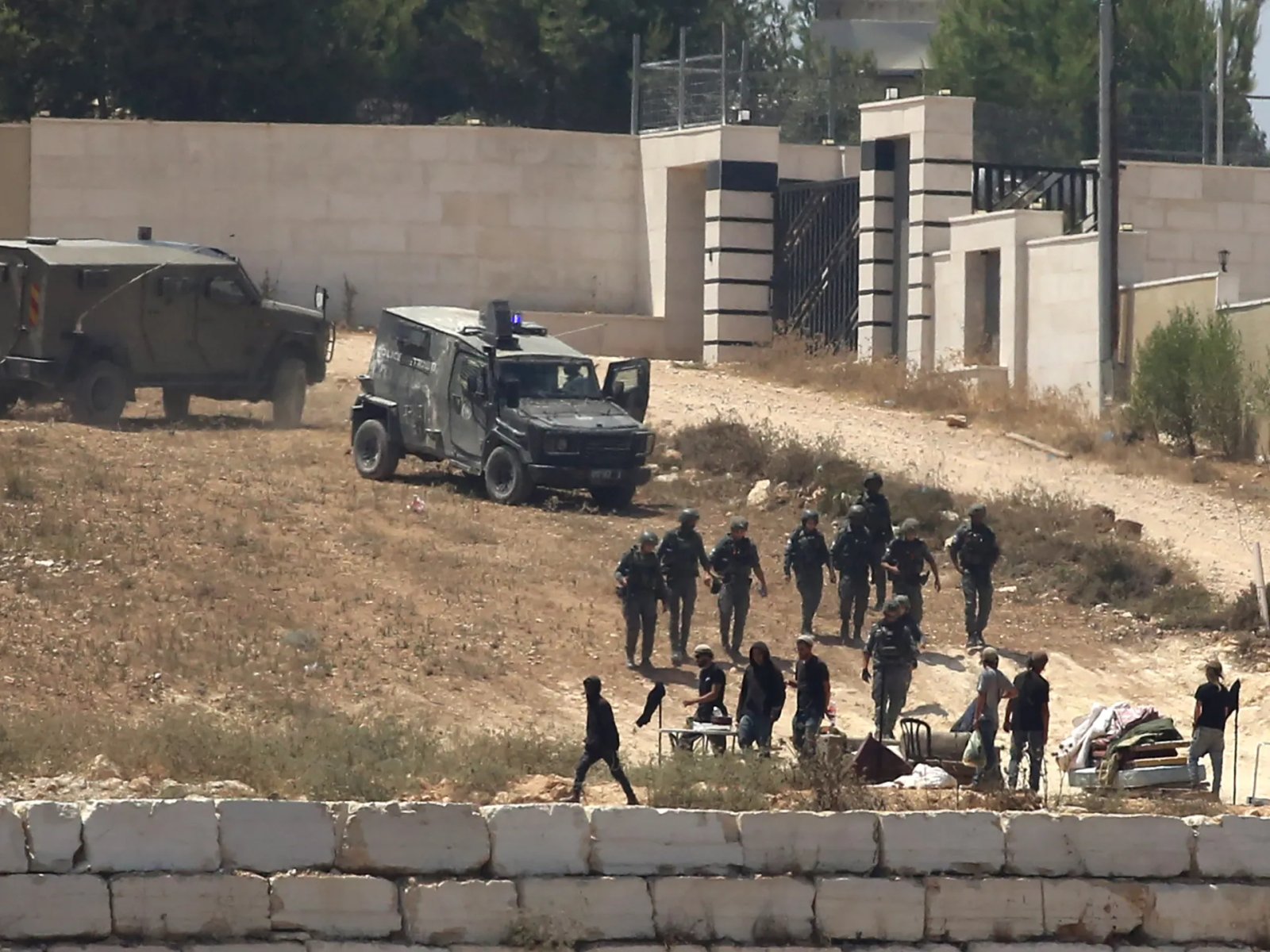 Israeli settlers besiege three Palestinian families in West Bank’s Qusra | Human Rights News